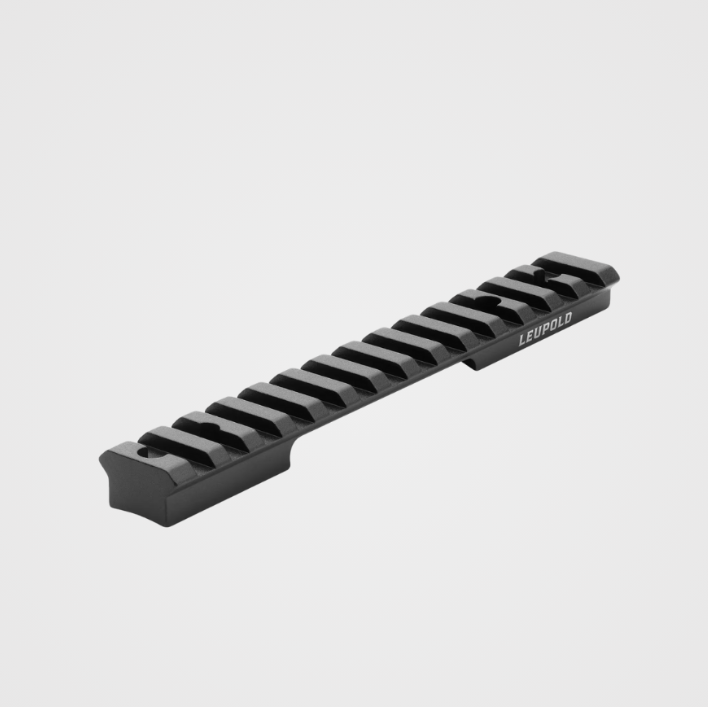Black rifle scope rail on a light gray background
