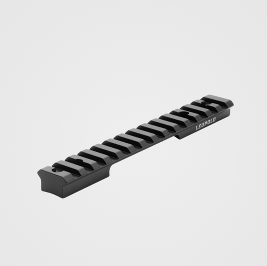 Black rifle scope rail on a light gray background